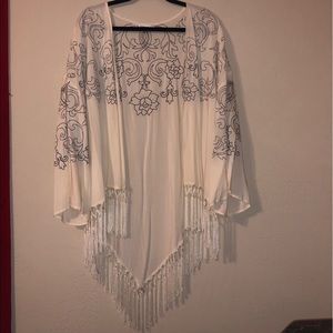 Cream kimono with floral pattern and fringe